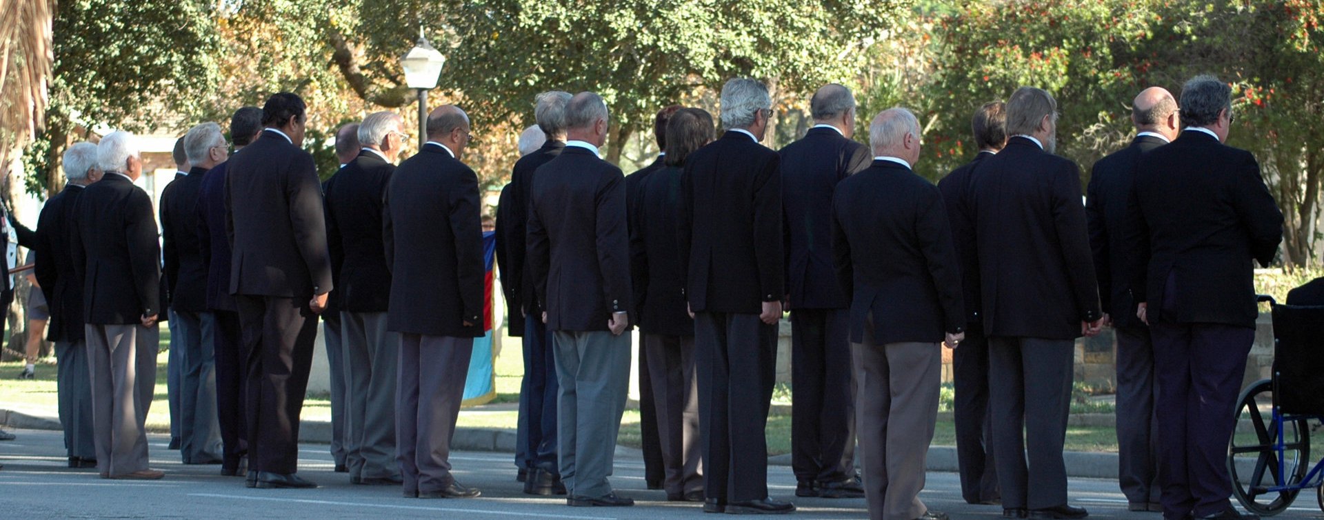 Group of men in black suit